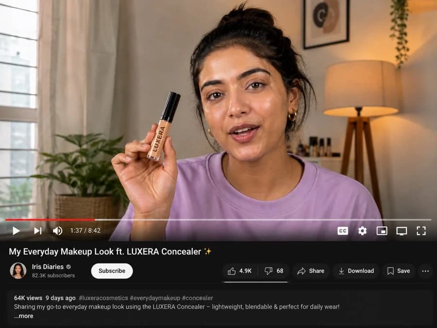 An influencer's makeup video featuring a brand's concealer, on its video page.